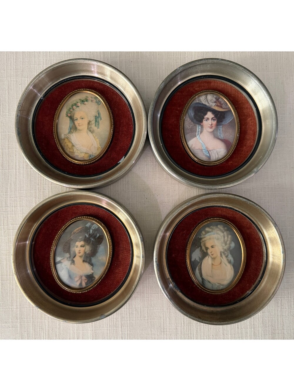 Set of 4 round framed portrait miniatures